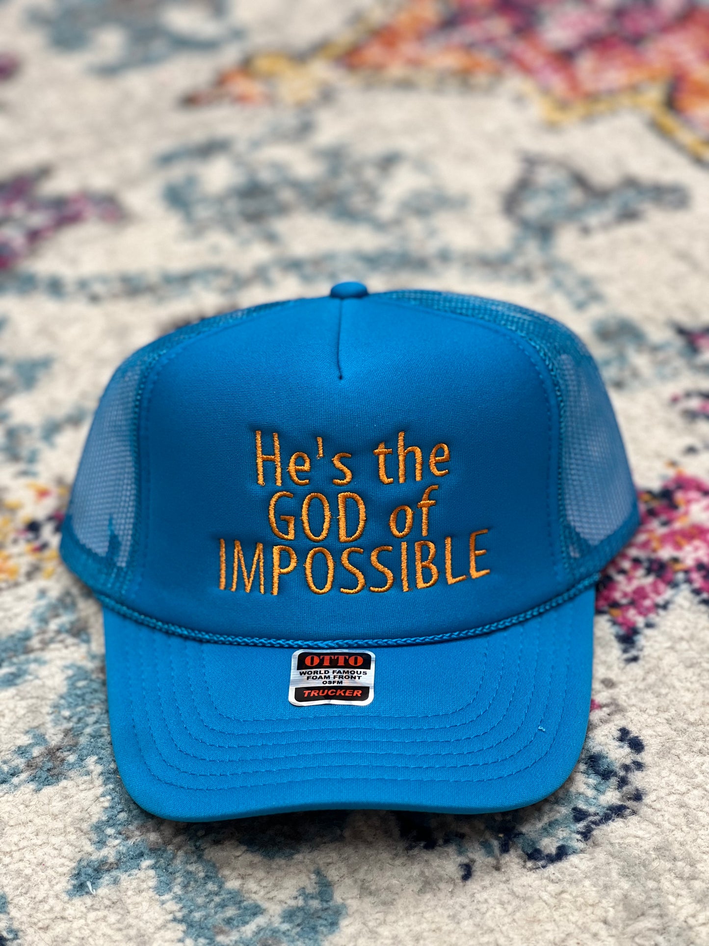 Hes the God of Impossible Trucker Hat (Multiple Colors)