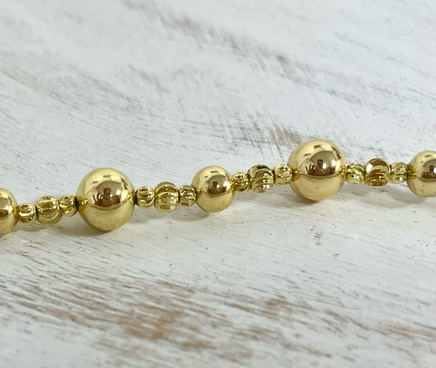 Multi Size Gold Bead Necklace